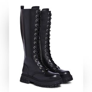 Knee high lace up combat boots from Delia’s by Dolls Kill